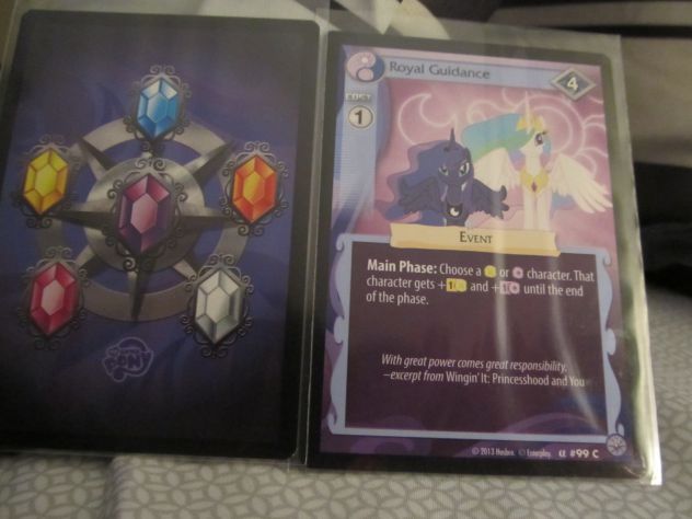 mlp tcg card.the pic on the left is what he back of the cards look like