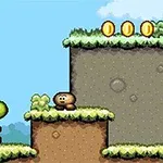 Yoshi in Goomba na zeleni trati z kovanci v igri Super Mario